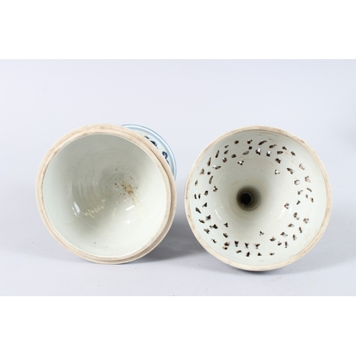172 - A CHINESE BLUE AND WHITE PORCELAIN PEDESTAL BOWL AND COVER, the cover with pierced decoration. 37cms... 