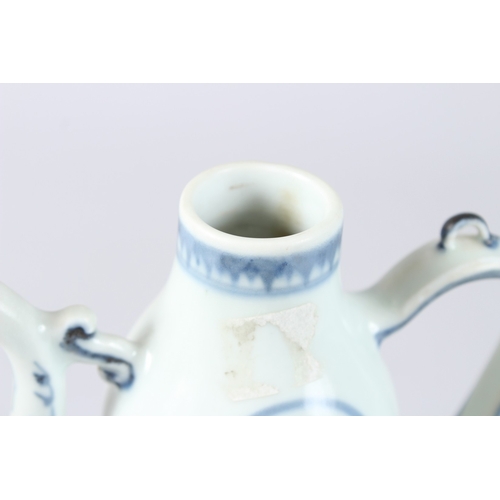 173 - A CHINESE BLUE AND WHITE PORCELAIN EWER AND COVER, decorated in the Islamic style.