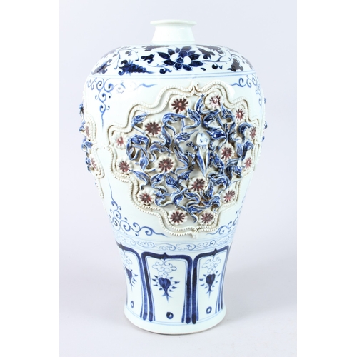 174 - A LARGE CHINESE BLUE, WHITE AND IRON RED MEIPING VASE, with moulded decoration. 42cms high.