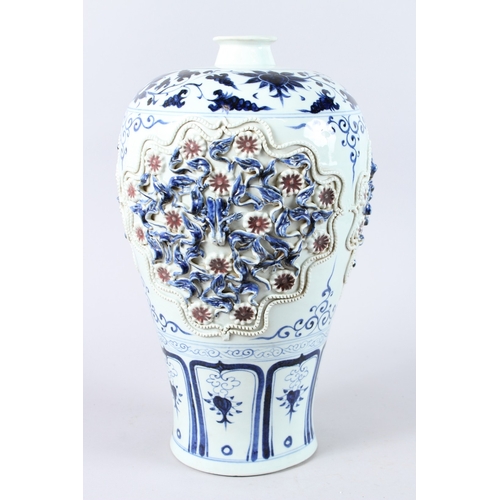 174 - A LARGE CHINESE BLUE, WHITE AND IRON RED MEIPING VASE, with moulded decoration. 42cms high.