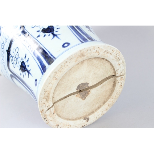 174 - A LARGE CHINESE BLUE, WHITE AND IRON RED MEIPING VASE, with moulded decoration. 42cms high.