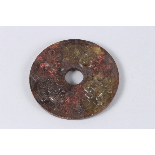 180 - A CHINESE CARVED JADE BI DISC, BELT HOOK AND A BRACKET (3).