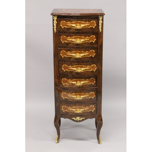 13 - A TALL NARROW LOUIS XVI STYLE CHEST with seven drawers, on short curving legs. 4ft 2ins high x 1ft 6... 