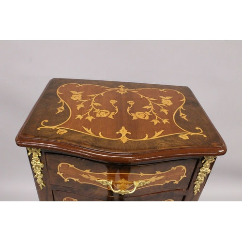 13 - A TALL NARROW LOUIS XVI STYLE CHEST with seven drawers, on short curving legs. 4ft 2ins high x 1ft 6... 