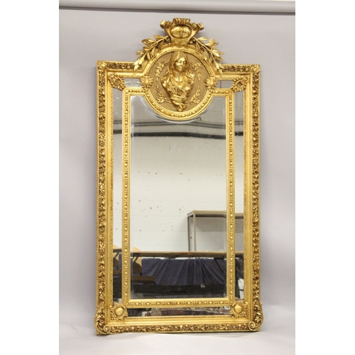38 - A VERY LARGE LOUIS XVI STYLE GILTWOOD MIRROR with a large gilt oval of a lady. 6ft 10ins high x 3ft ... 