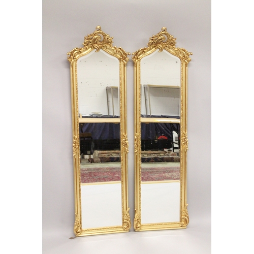 39 - A PAIR OF LOUIS XVI STYLE GILTWOOD LONG MIRRORS. 5ft 9ins high x 1ft 6ins wide.