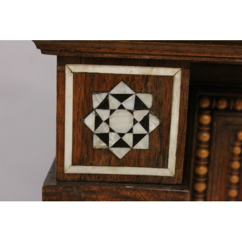 59 - AN IMPRESSIVE ITALIAN OR EGYPTIAN MOTHER-OF-PEARL INLAID HARDWOOD ORIENTAL CUPBOARD in the style of ... 