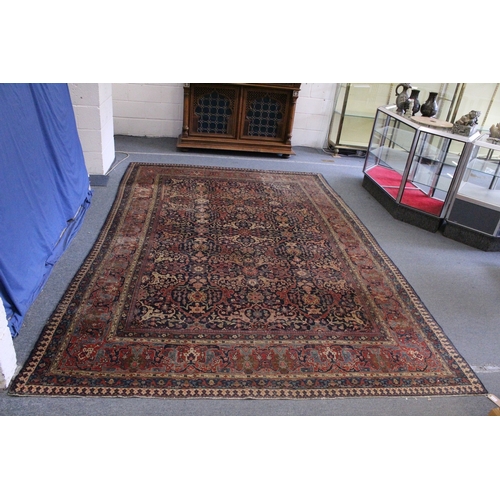 6 - A VERY LARGE PERSIAN CARPET with allover floral motifs, in a triple row motif. 11ft 3ins x 7ft 10ins... 