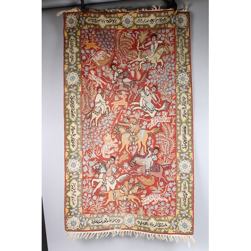 A GOOD PERSIAN WOOLWORK RUG with figures on horseback etc. Signed. 5ft ...