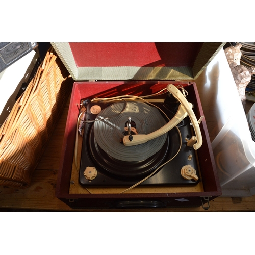 Portable record players, a projector and other items.