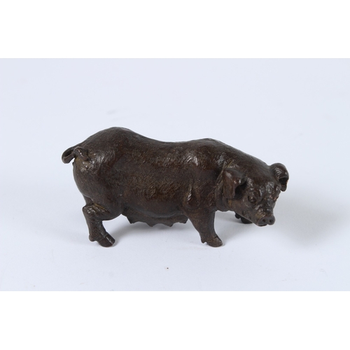 105 - A JAPANESE BRONZE OKIMONO SOW. 7.5cms.