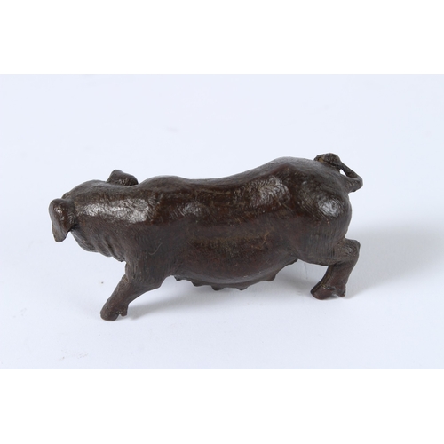 105 - A JAPANESE BRONZE OKIMONO SOW. 7.5cms.