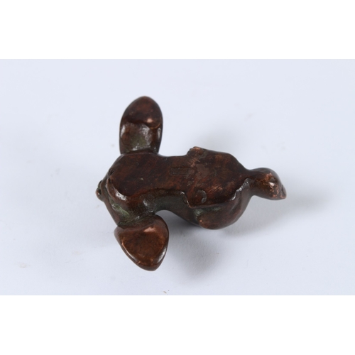 107 - A JAPANESE BRONZE OKIMONO RABBIT. 5cms.