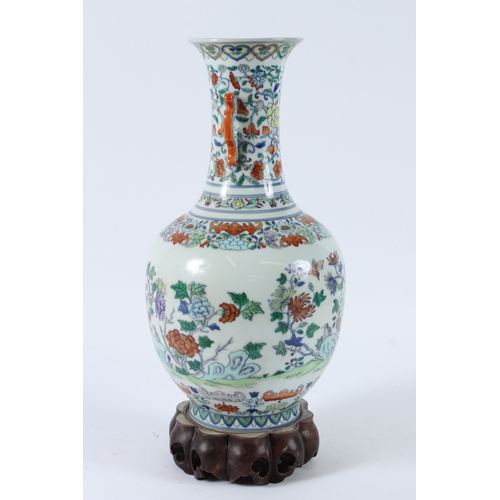 110 - A FINE CHINESE DUCAI VASE with hardwood stand. 36cms high.