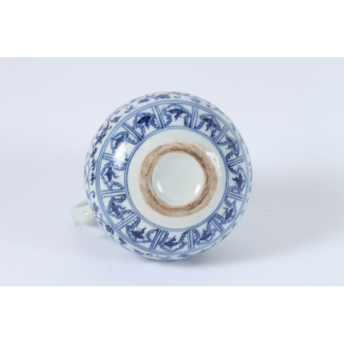 113 - A CHINESE BLUE AND WHITE EWER. 14cms high.