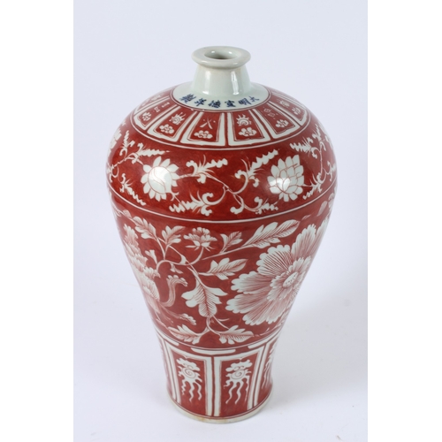 115 - A CHINESE UNDERGLAZE RED MEIPING. 34cms high.