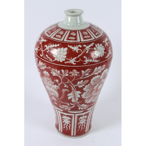 115 - A CHINESE UNDERGLAZE RED MEIPING. 34cms high.