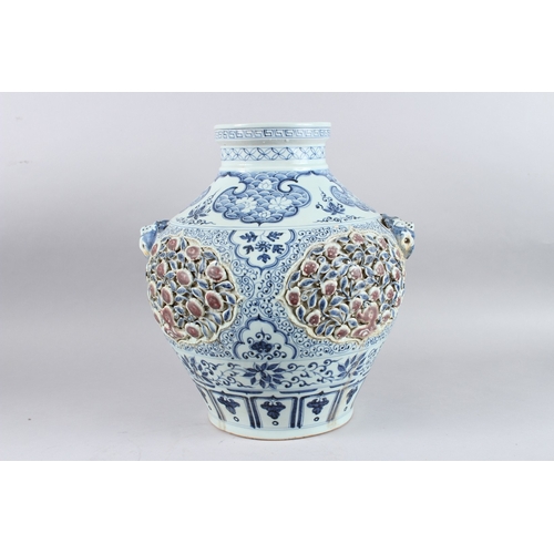 122 - A FINE CHINESE UNDERGLAZE RED, BLUE AND WHITE JAR. 36cms high.