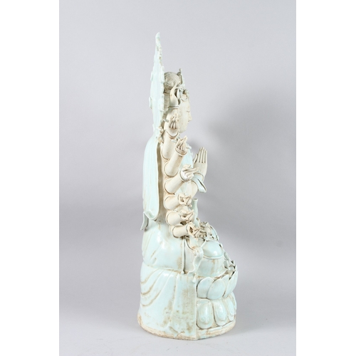 123 - A CHINESE YINQING GLAZE THOUSAND ARMED AVALOKITESVARA. 51cms high.