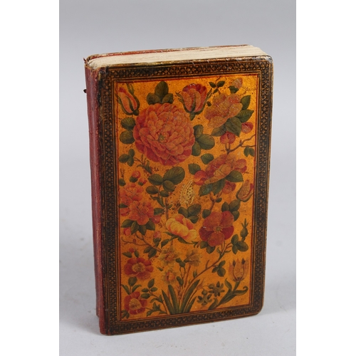 132 - A SMALL QAJAR QURAN 19TH CENTURY IRAN. 15cms long x 9cmswide x 2cms deep with nice painted lacquer b... 