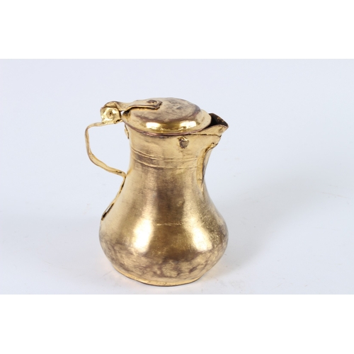 148 - AM OTTOMAN TURKISH TOMBAK METAL WATER JUG. 12cms high.