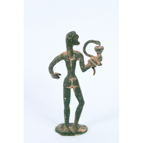 193 - AN ANCIENT BRONZE SCULPTURE, STANDING MAN with green patina. 15cms high.