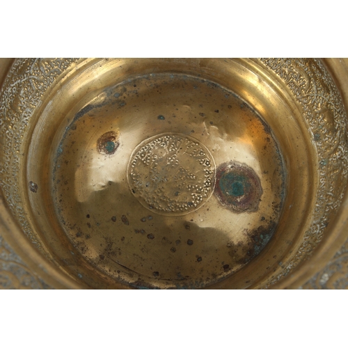 202 - A 19TH CENTURY SYRIAN HAND CARVED BRASS BASIN. 40cms diameter.
