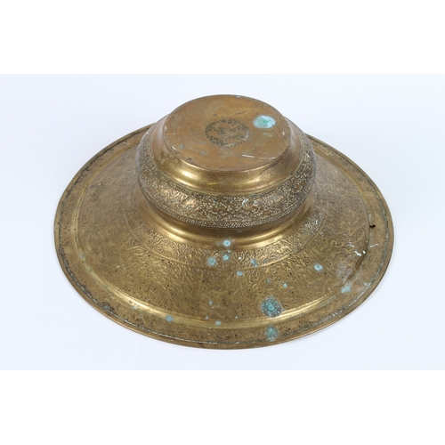 202 - A 19TH CENTURY SYRIAN HAND CARVED BRASS BASIN. 40cms diameter.
