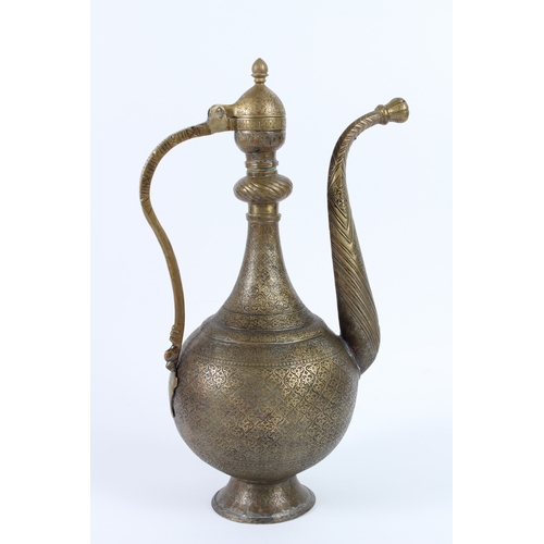 213 - A FINE AND LARGE 19TH CENTURY CENTRAL ASIAN BUKHARA ENGRAVED BRASS EWER. 46cms high.