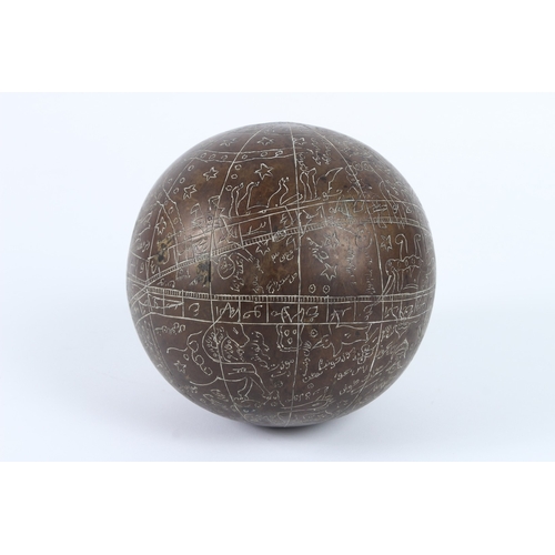 220 - A 19TH - 20TH CENTURY INDIAN ENGRAVED BRASS CELESTIAL GLOBE. 14cms diameter.