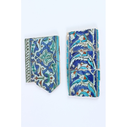226 - TWO 16TH - 17TH CENTURY OTTOMAN IZNIK GLAZED POTTERY BORDER TILES. 24cms x 13cms x 22cms x 1cm.
