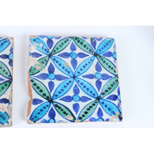 228 - TWO 19TH CENTURY INDIAN MULTAN TILES. 19cms x 19cms.