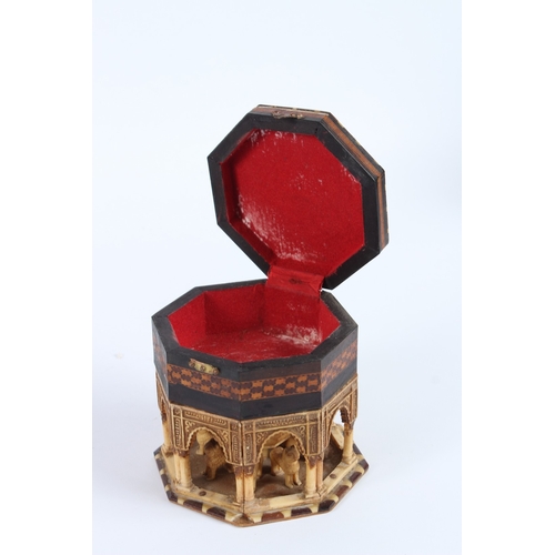230 - AN EARLY 20TH CENTURY MOORISH SPANISH INLAID BOX with Alhambra fountain design. 11cms.