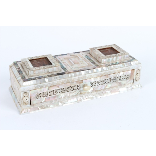 234 - A 19TH CENTURY HOLY LAND JERUSALEM MOTHER-OF-PEARL CLAD WOODEN INKWELL STAND. 26cms high.