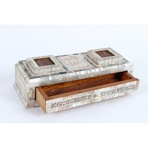 234 - A 19TH CENTURY HOLY LAND JERUSALEM MOTHER-OF-PEARL CLAD WOODEN INKWELL STAND. 26cms high.