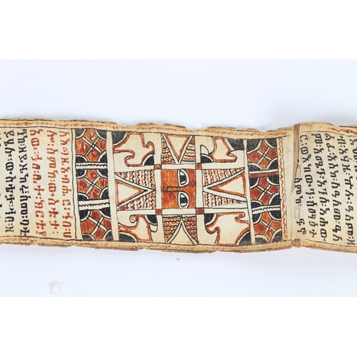 235 - A 19TH CENTURY ETHIOPIAN CALLIGRAPHIC SCROLL. 178cms high x 8cms wide.