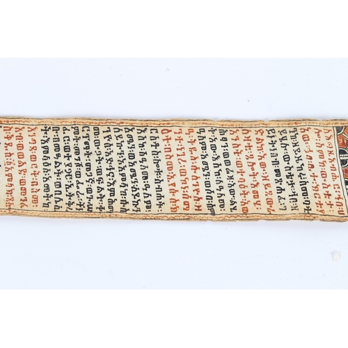 235 - A 19TH CENTURY ETHIOPIAN CALLIGRAPHIC SCROLL. 178cms high x 8cms wide.