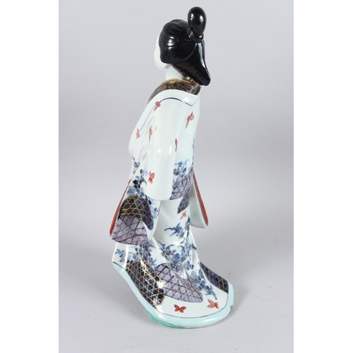 64 - A LARGE JAPANESE PORCELAIN GEISHA. 44cms high.