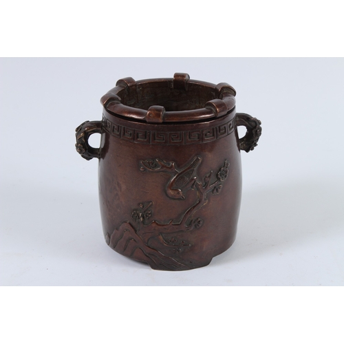 72 - A CHINESE BRONZE INCENSE BURNER. 12cms high.