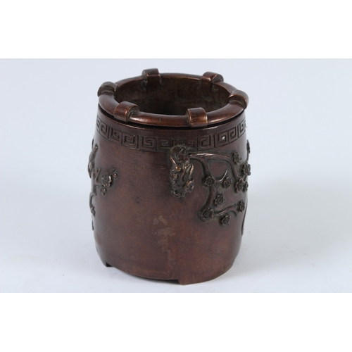 72 - A CHINESE BRONZE INCENSE BURNER. 12cms high.