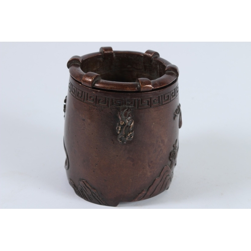 72 - A CHINESE BRONZE INCENSE BURNER. 12cms high.