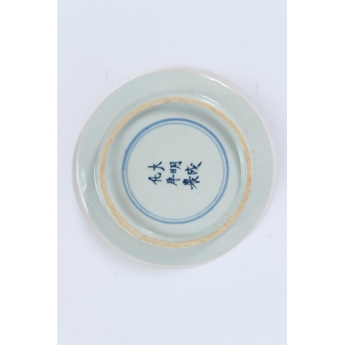 73 - CHINESE BLUE AND WHITE ANTIQUE PLATE. 11cms diameter.