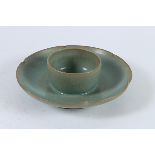76 - A CHINESE RU WARE TEACUP TRAY. 17cms diameter.