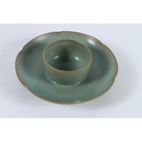 76 - A CHINESE RU WARE TEACUP TRAY. 17cms diameter.