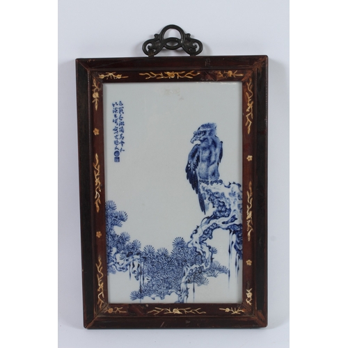 79 - A FINE CHINESE BLUE AND WHITE PLAQUE with bone mount frame. 34cms x 21cms.