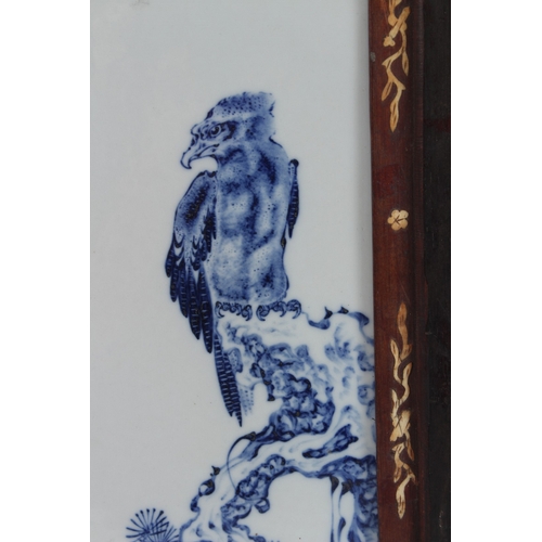 79 - A FINE CHINESE BLUE AND WHITE PLAQUE with bone mount frame. 34cms x 21cms.