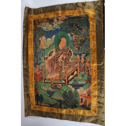 81 - A TIBETAN THANGKA ON SILK.