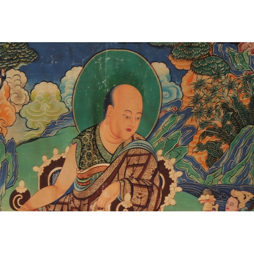 81 - A TIBETAN THANGKA ON SILK.