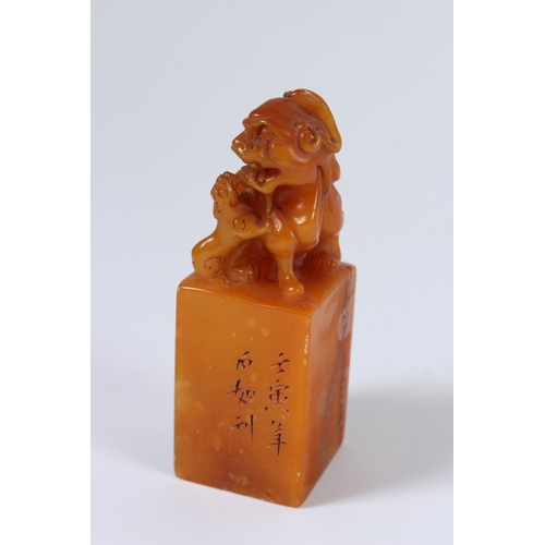 84 - A CHINESE SOAPSTONE SEAL. 12cms high.