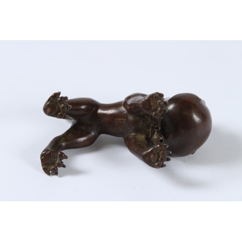 94 - A JAPANESE BRONZE DOG. 8cms.
